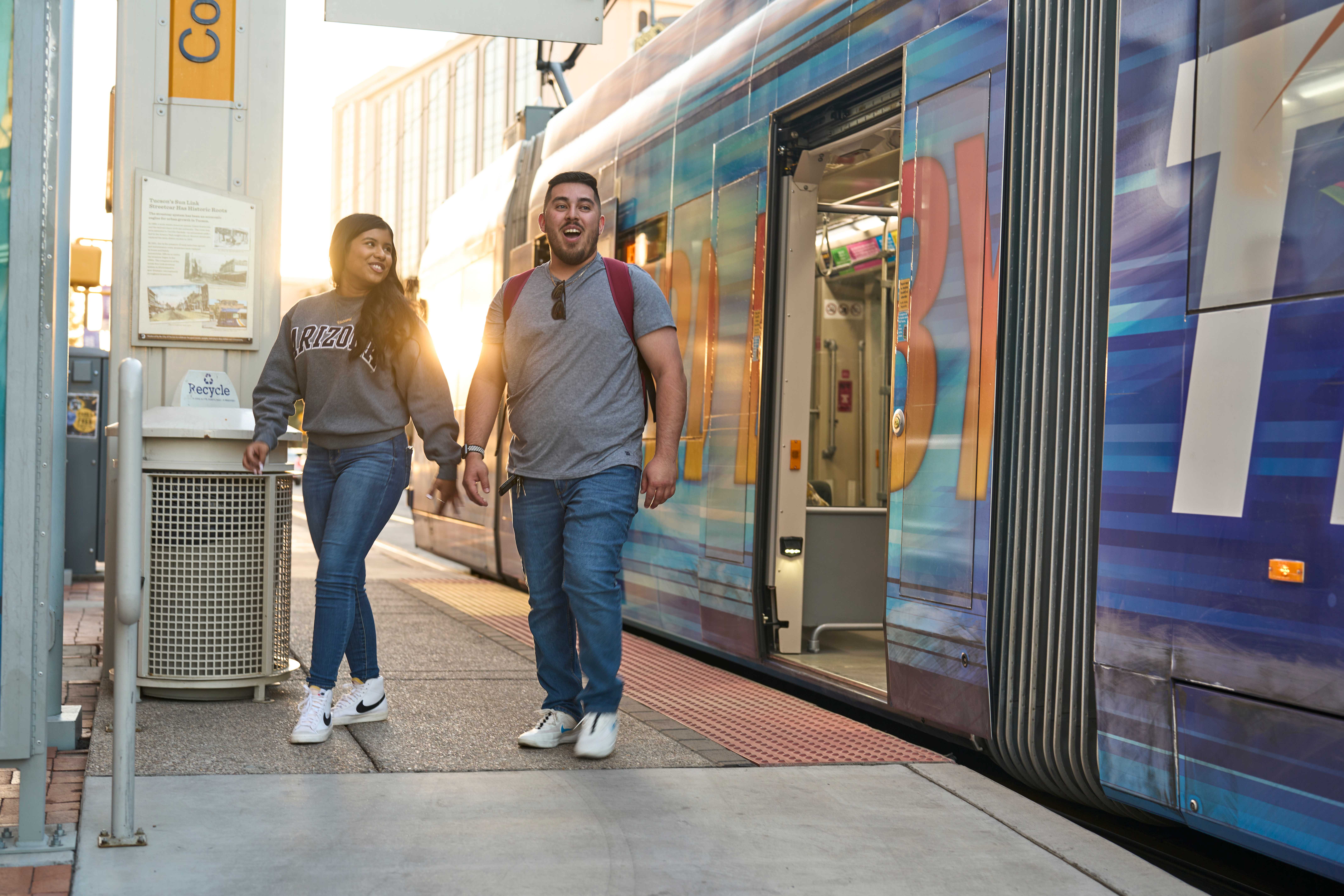 Students await the Sunlink Streetcar in Downtown Tucson.