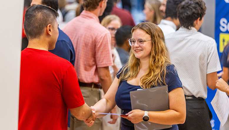 Students shaking hands