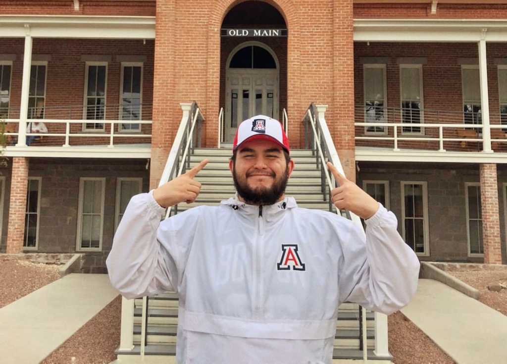 Harrison in front of Old Main