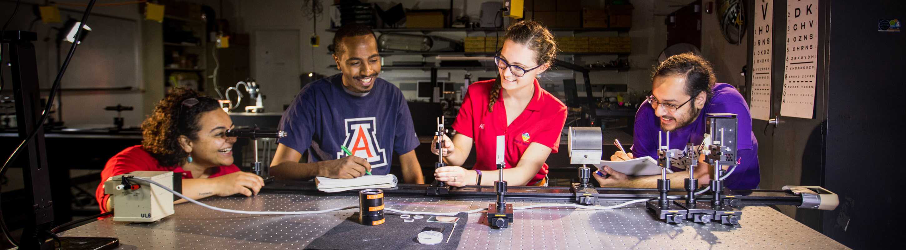 Students working in optics lab